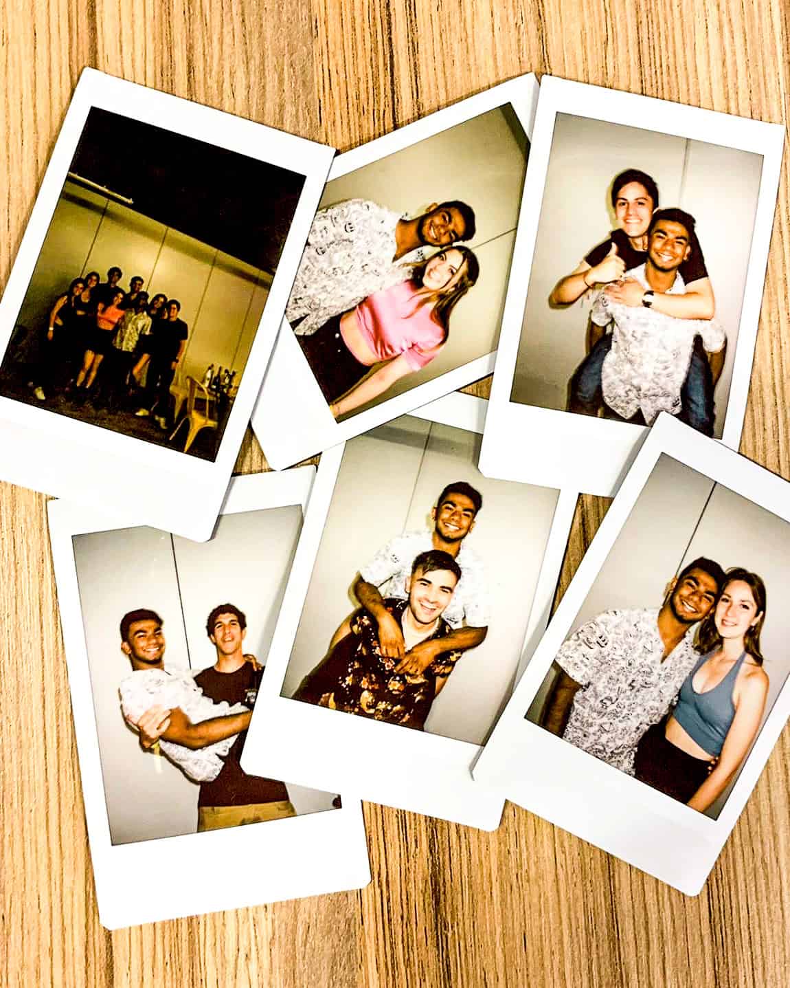 Living in Spain A group of polaroid photos of young men and women at an apartment in Madrid, Spain