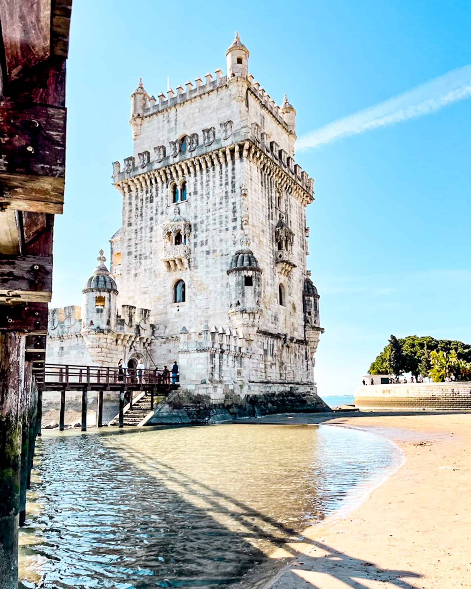 5 Days in Lisbon Belém Tower against a blue sky in Lisbon, Portugal