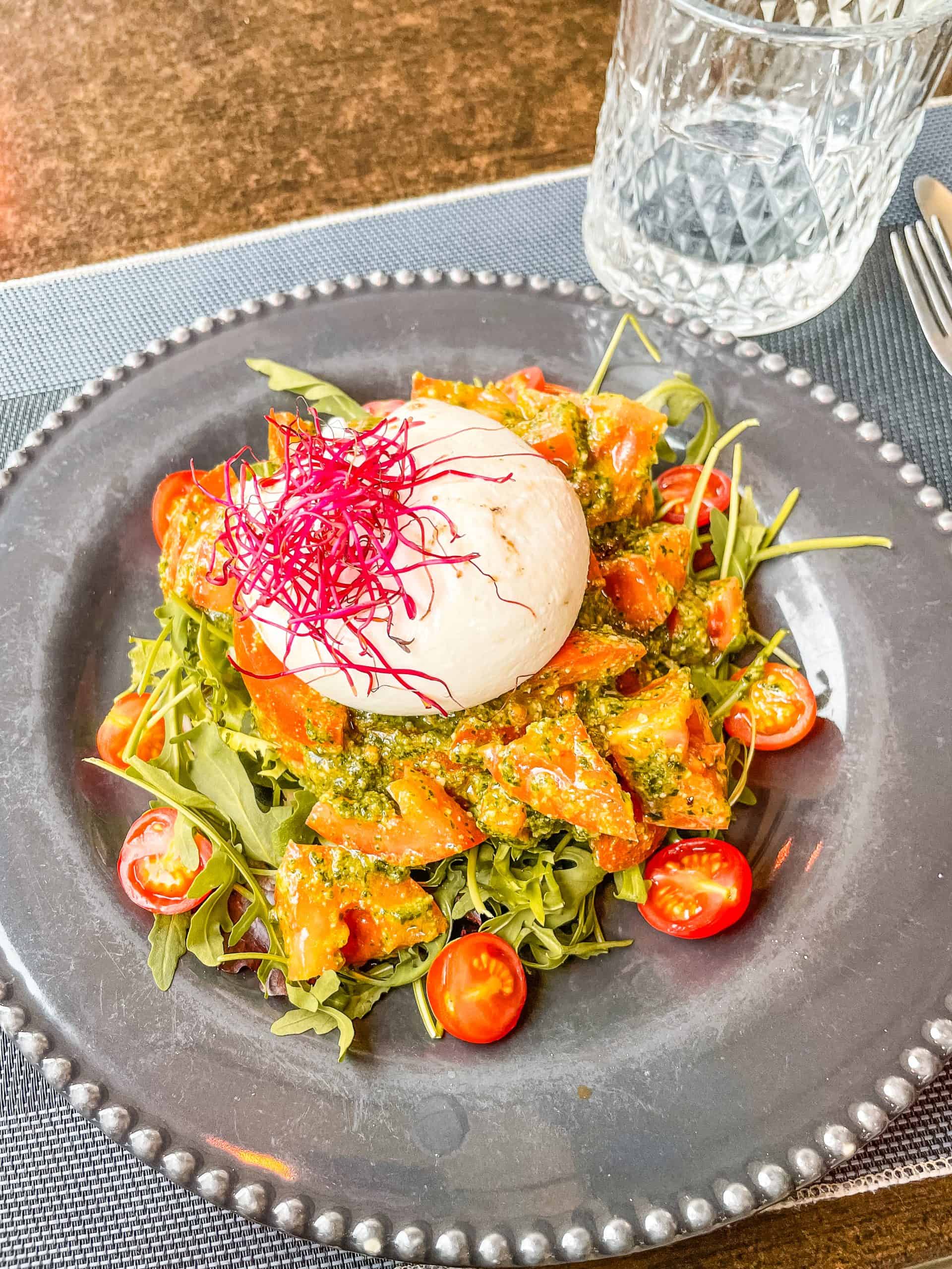 Living in Spain Mozzarella and tomato salad at a restaurant in Madrid, Spain