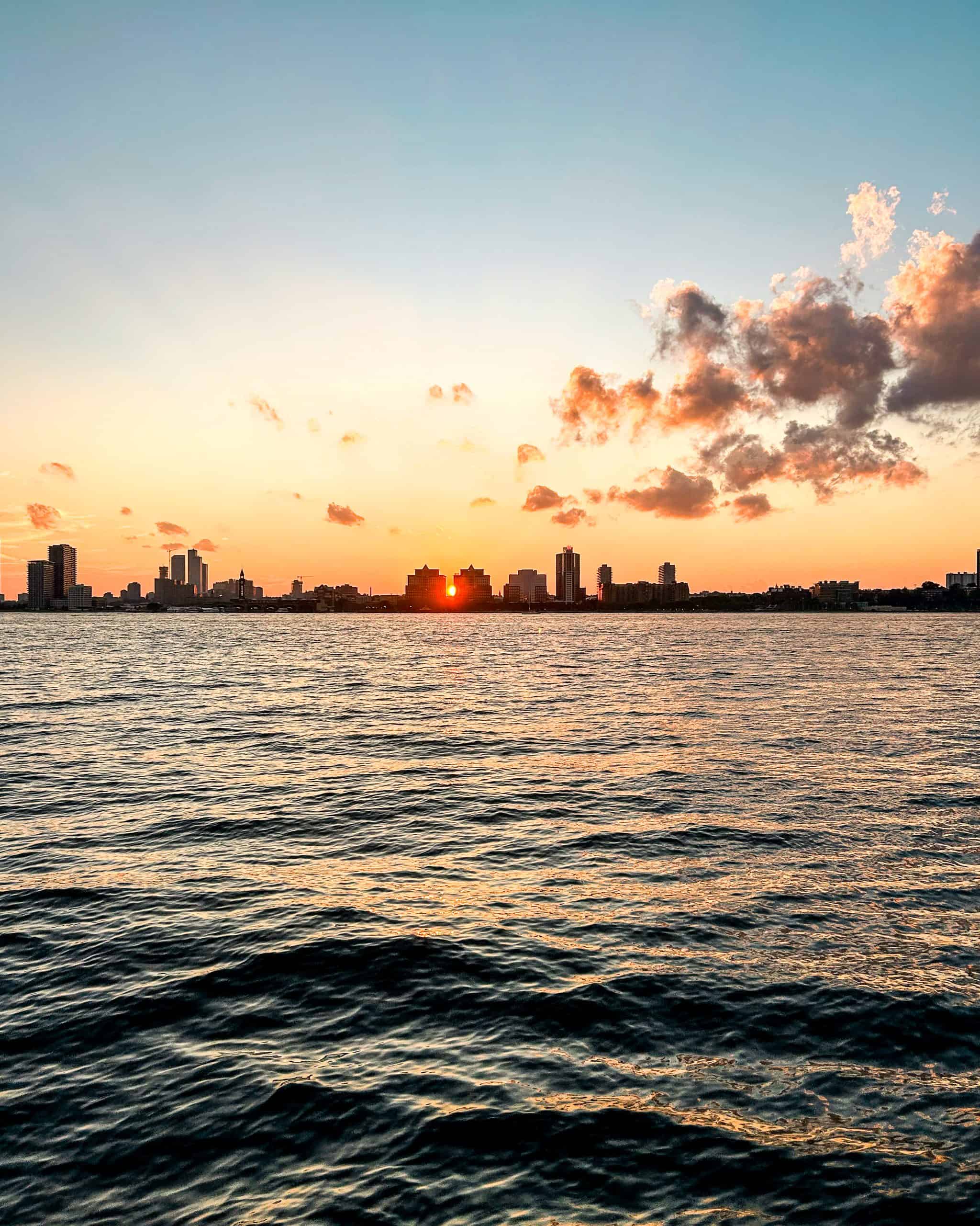 Sunset with the city skyline along the Hudson River in New York City