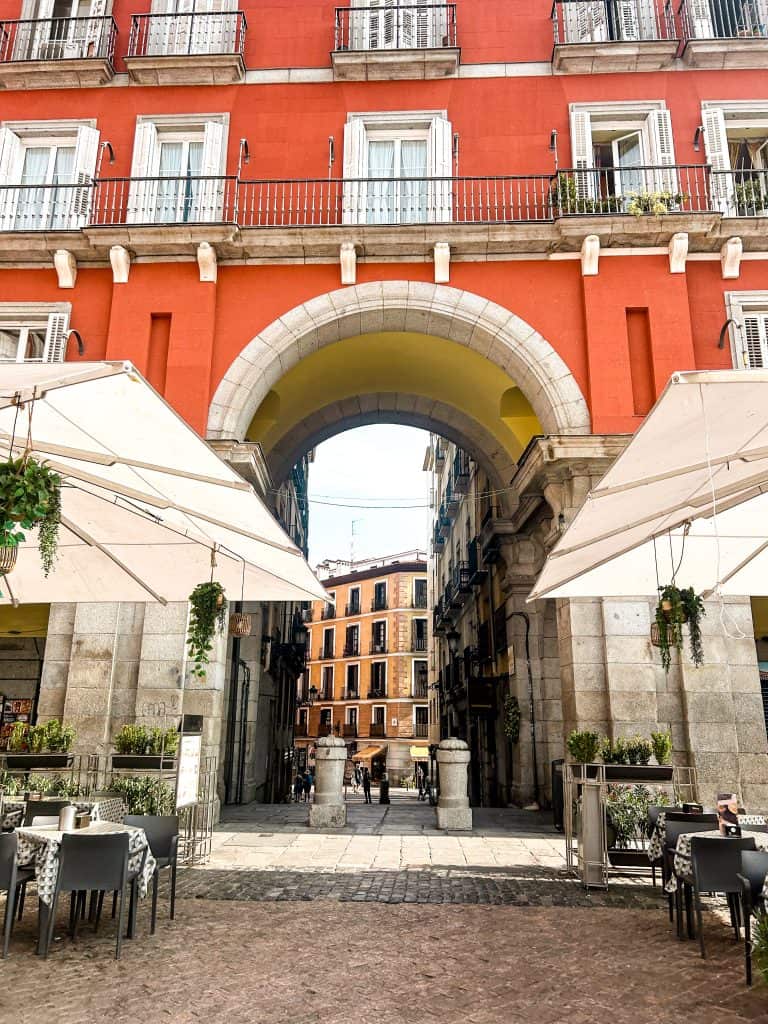 Living in Spain An empty cafe in a plaza in Madrid, Spain