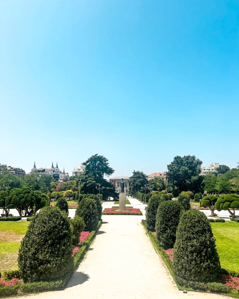 non-touristy things to do in Madrid Large park on a sunny summer day in Madrid, Spain