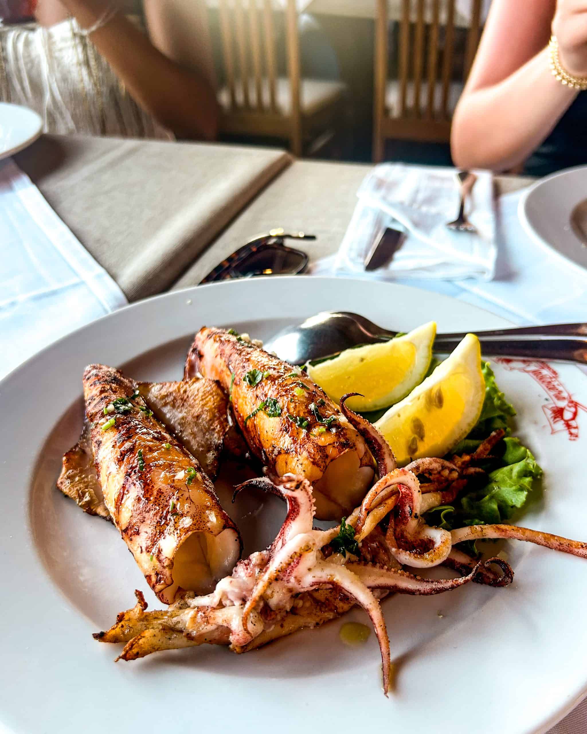 Is Croatia worth visiting? Grilled squid with lemon at a restaurant in Croatia