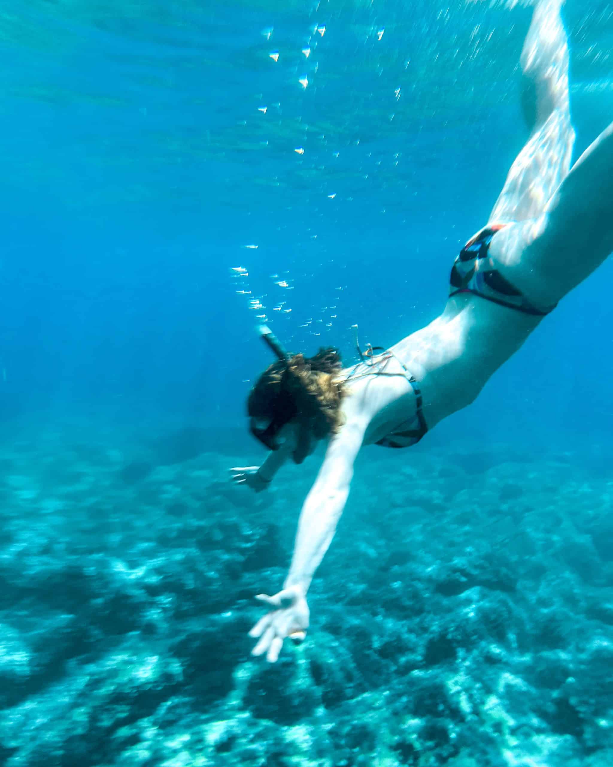 9 days in Croatia Woman snorkeling underwater in the Adriatic Sea in Croatia