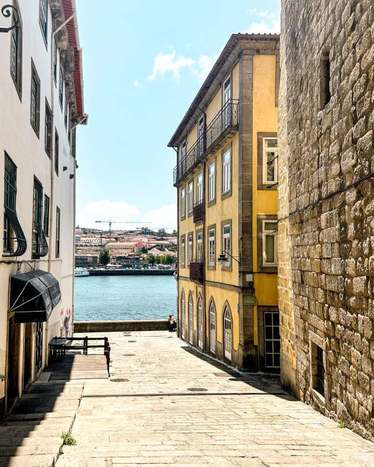 Narrow street in Porto, Portugal near the Douro River