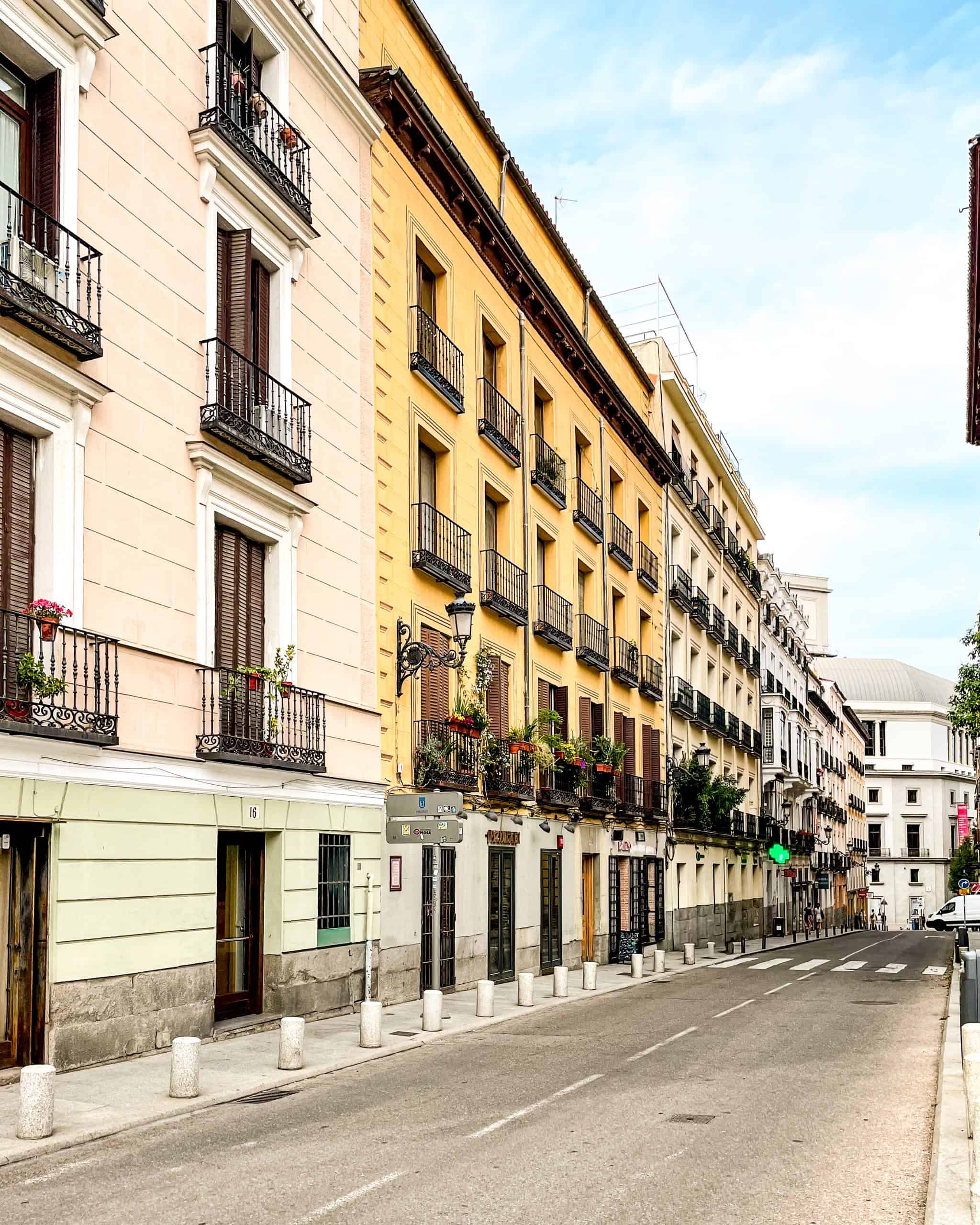 quiet residential street with colorful buildings in Spain