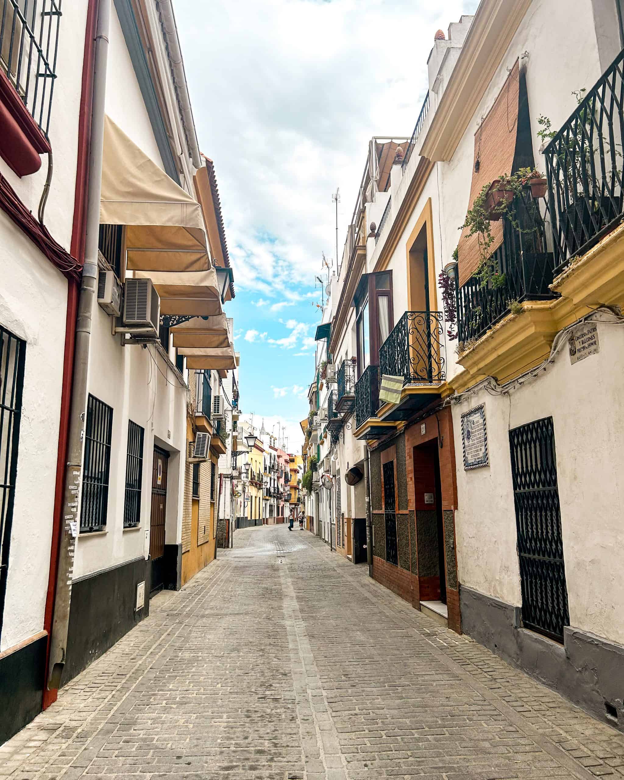quiet neighborhood street in Seville, Spain