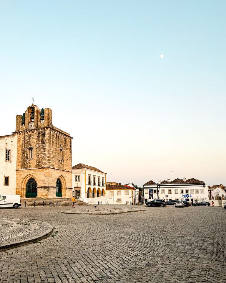 cobblestone courtyard near the cathedral in faro, Portugal at dusk