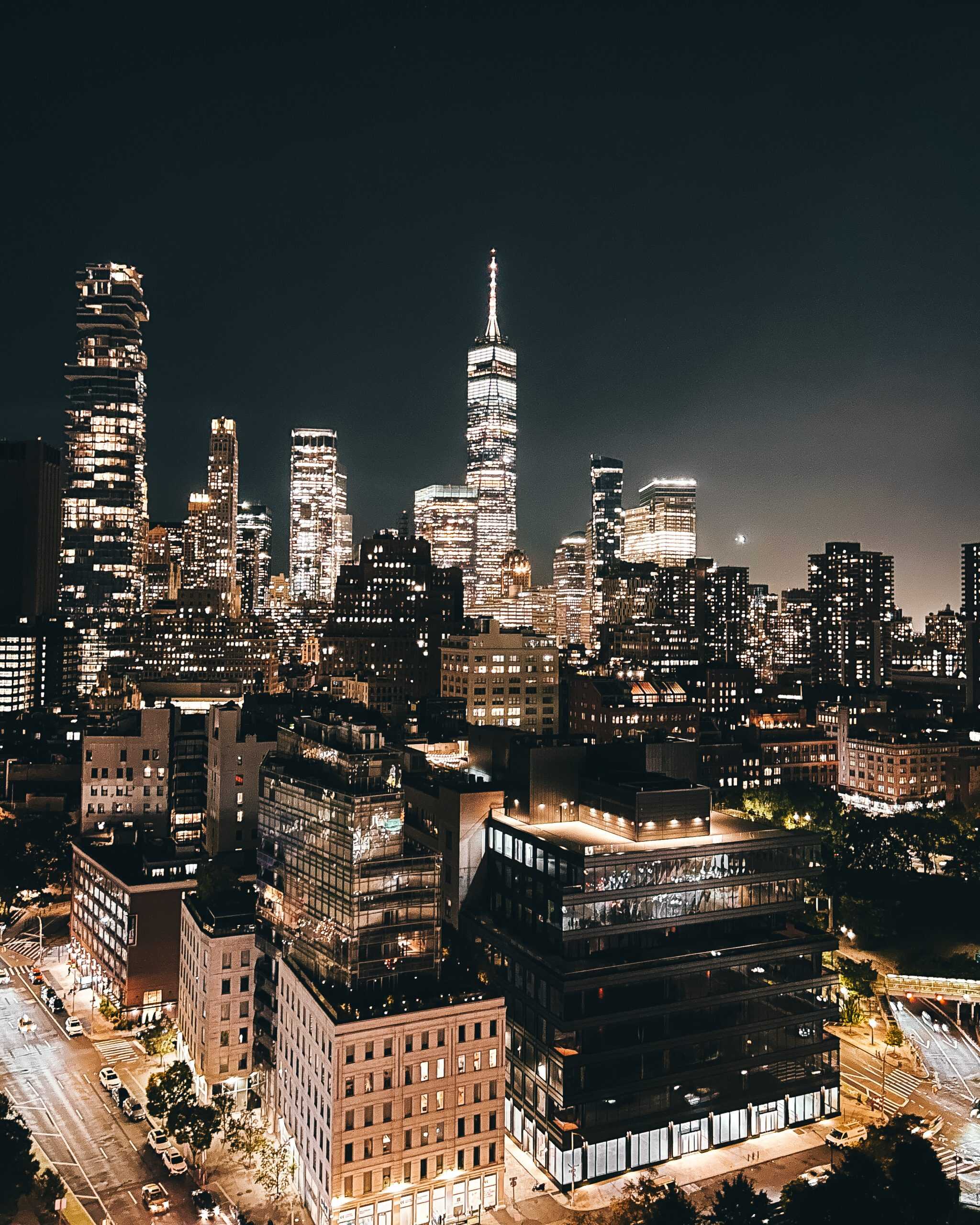 NYC skyline from a rooftop bar in SoHo at night