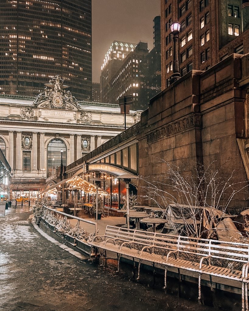 Grand Central station in NYC lit up at night during the winter
