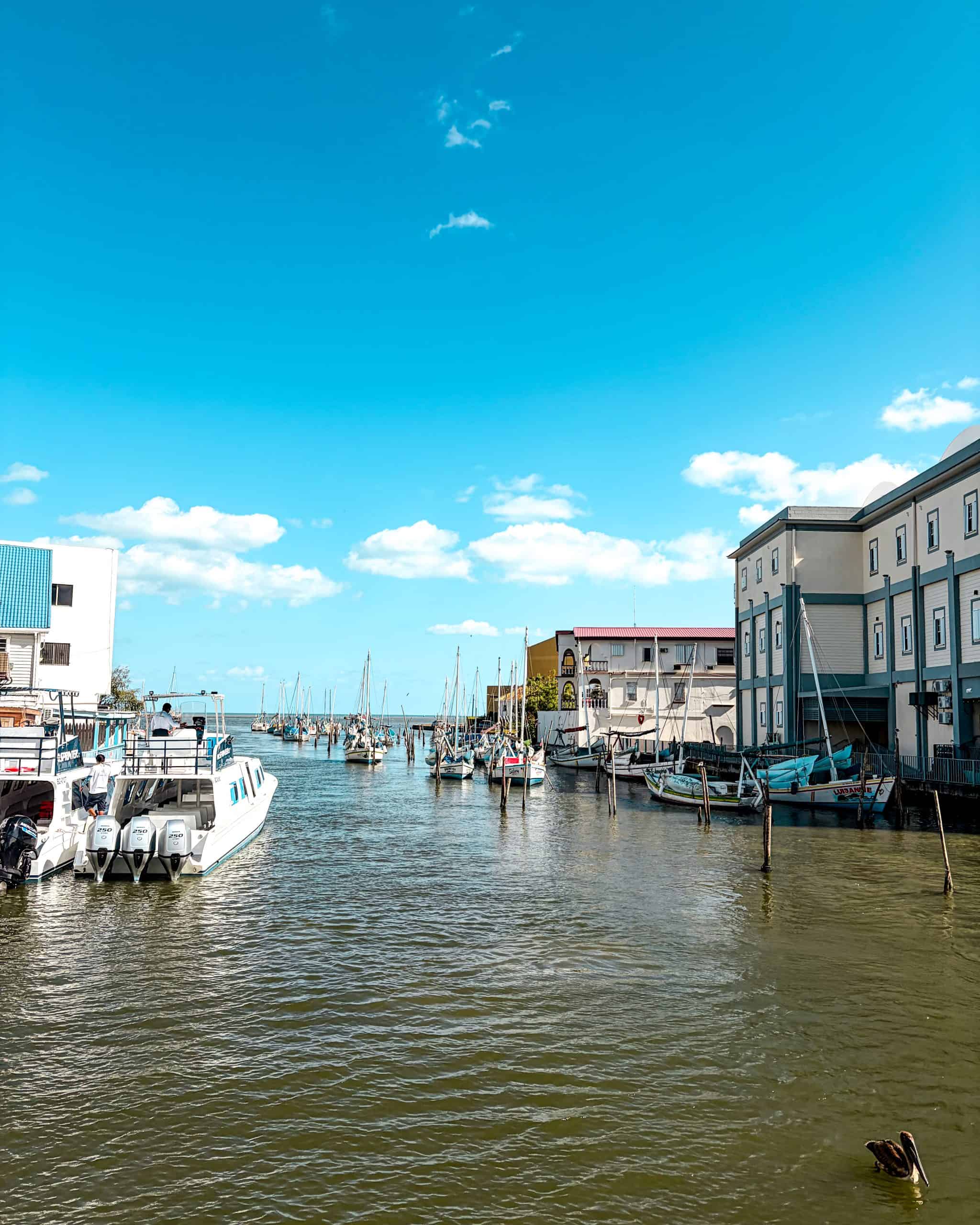 Passengers boarding a water taxi at the dock in Belize City